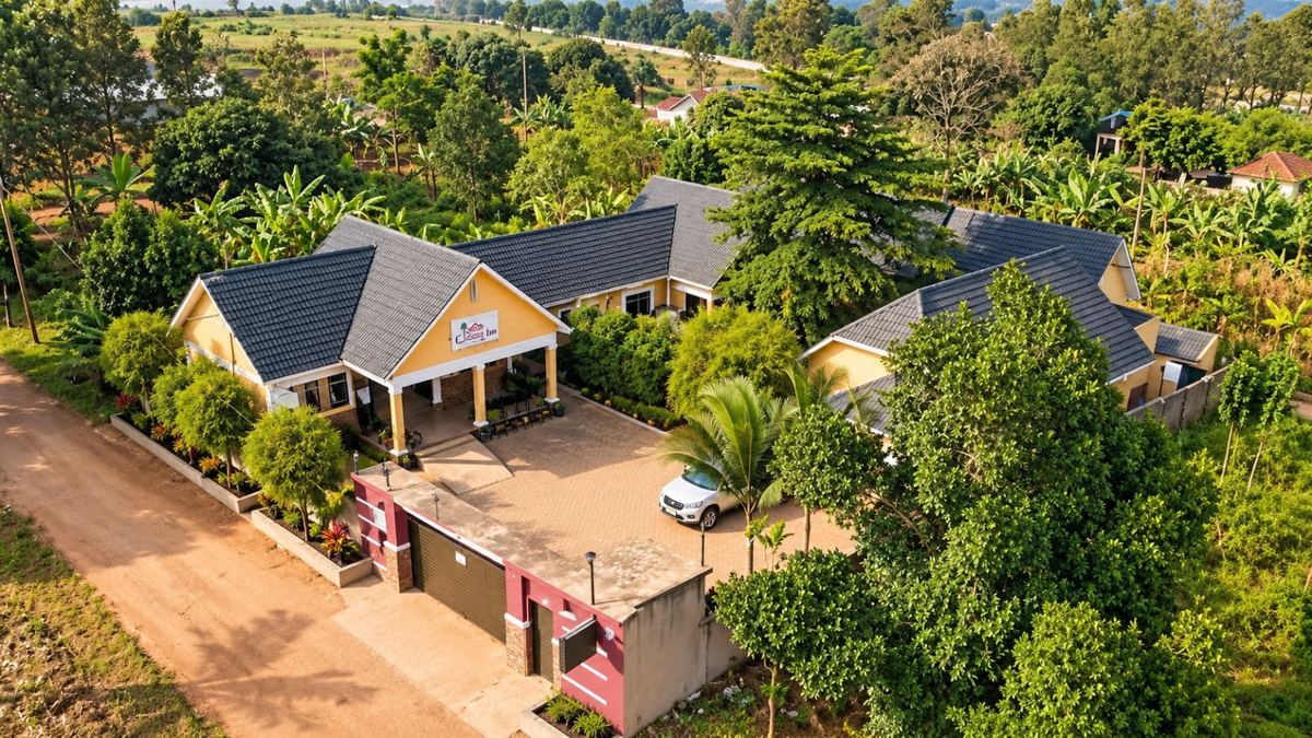 Aerial view of The Cosy Inn Kiwenda showing the courtyard and surrounding greenery